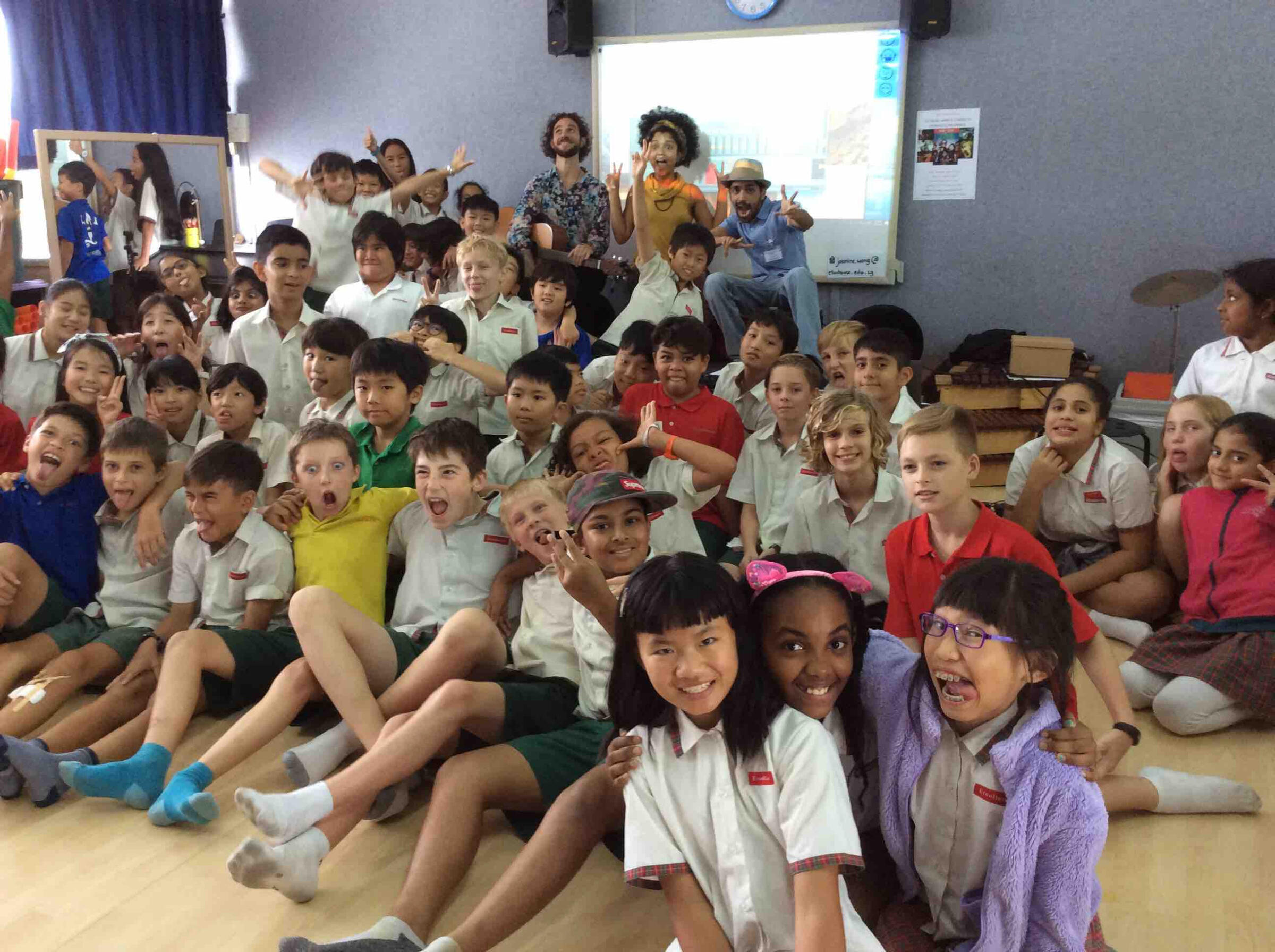 Songwriting workshop in Singapore school classroom Music Workshop Singapore songwriting workshop in a school classroom in Singapore where students write lyrics and create songs together